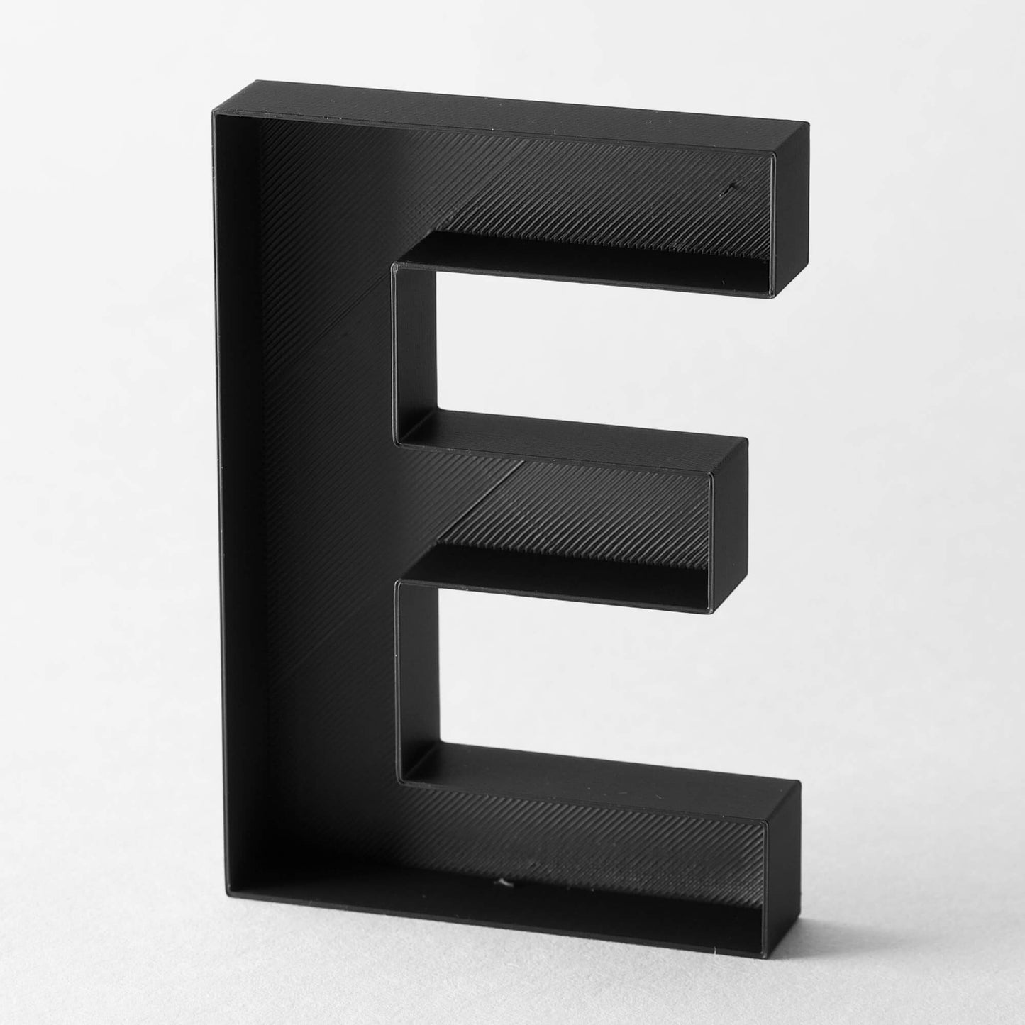 E – Buchstabe