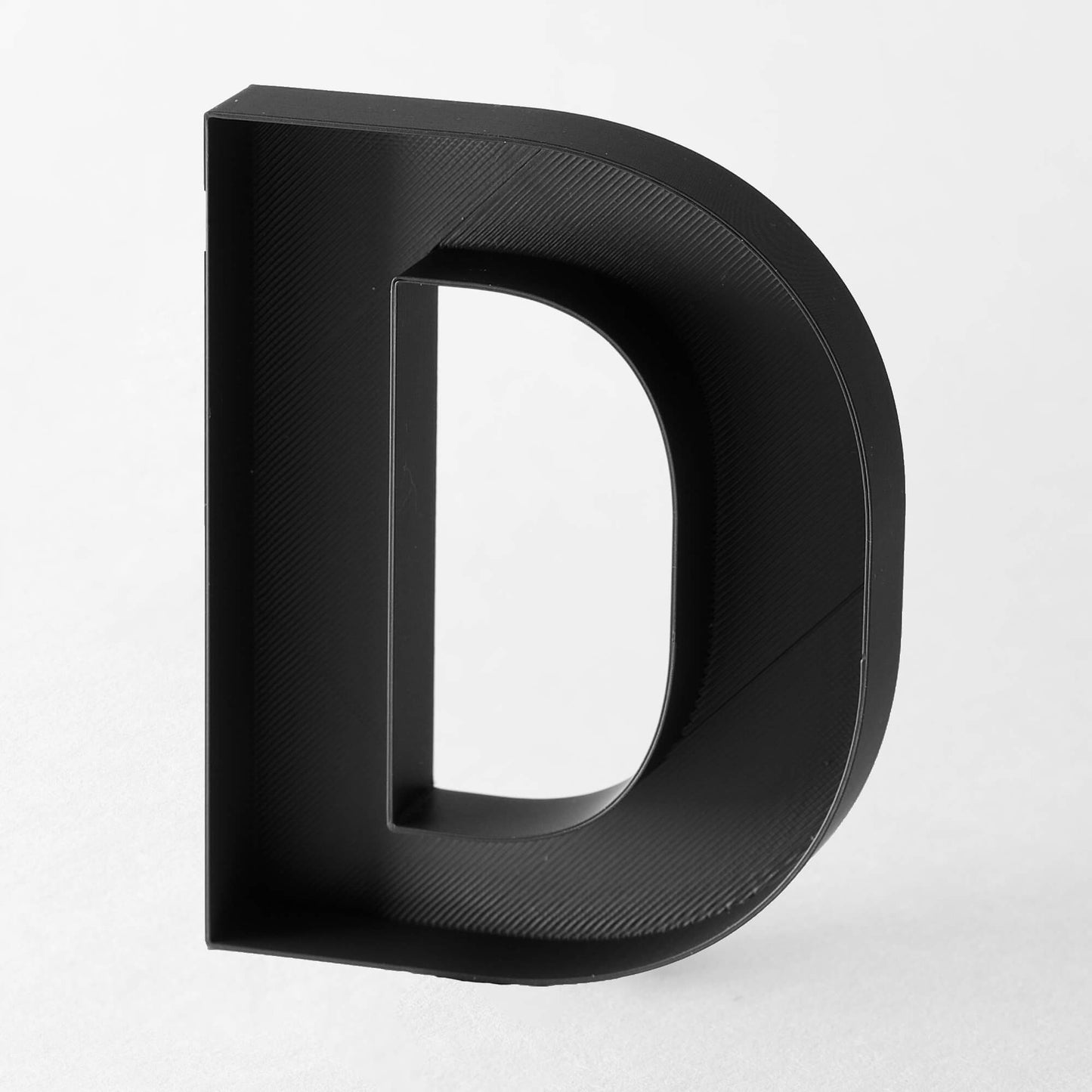D – Buchstabe